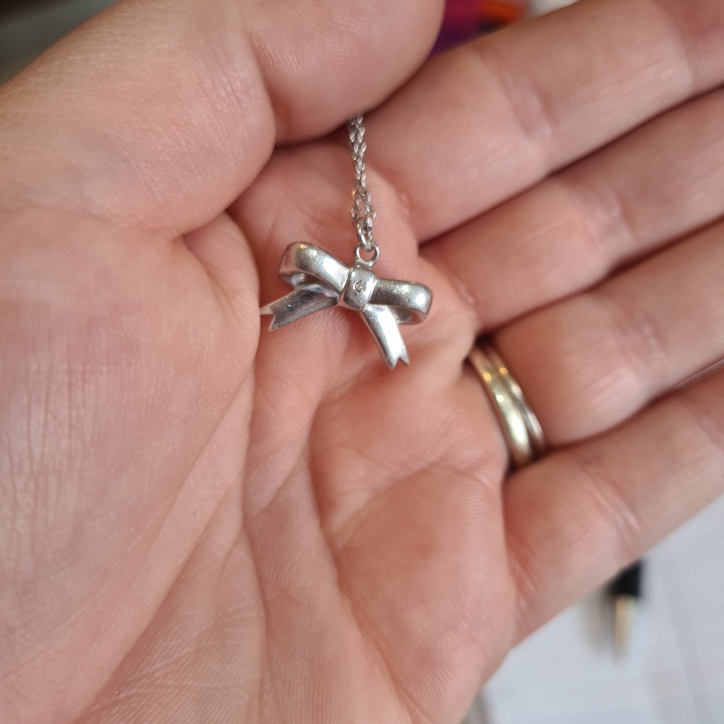 Genuine Hot Diamond Oversized Bow Necklace With Small CZ? Diamond? In the Middle