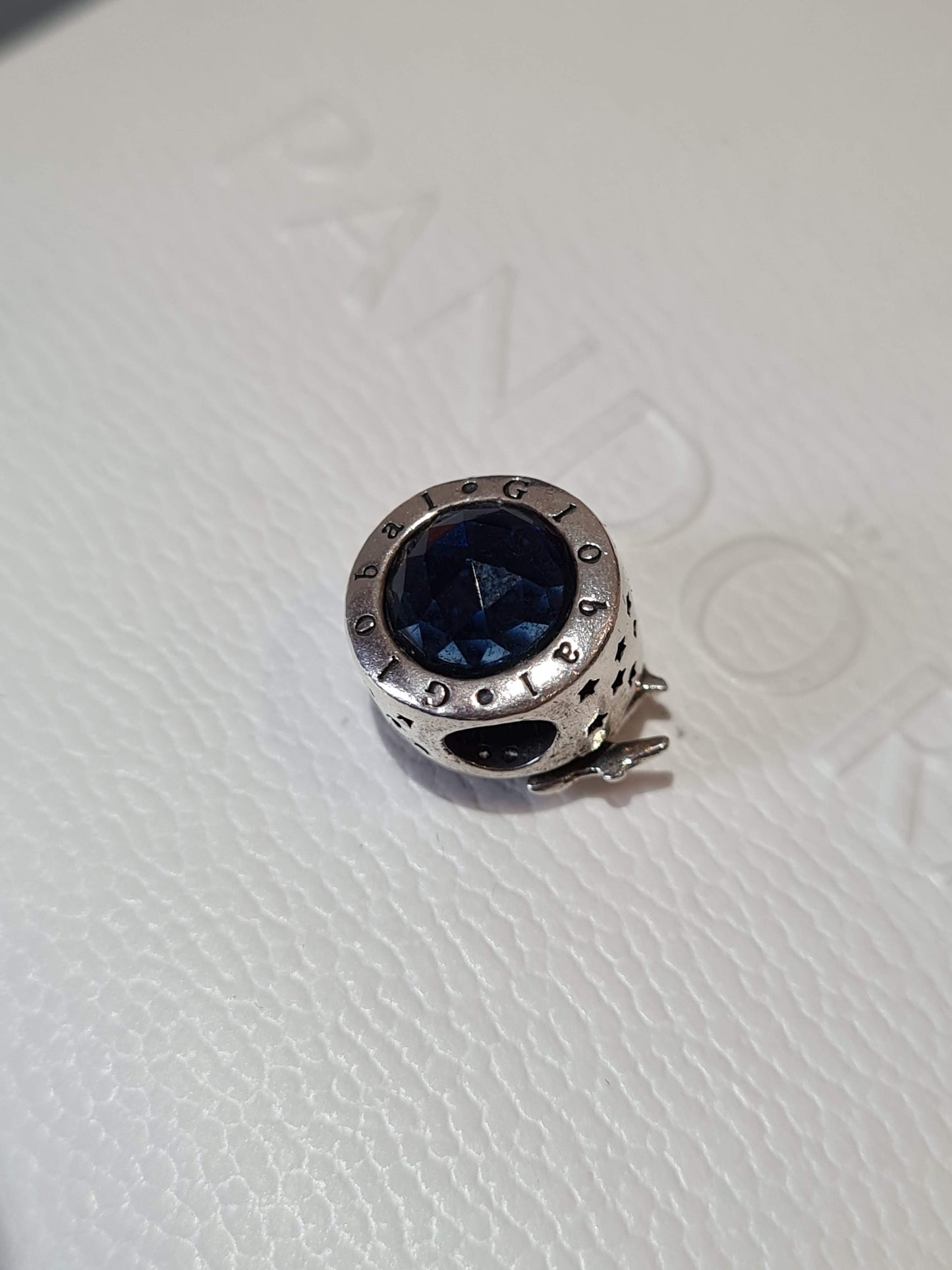 Genuine Silver Travel Charm With Beauiful Blue Stone and Aeroplane Detail.