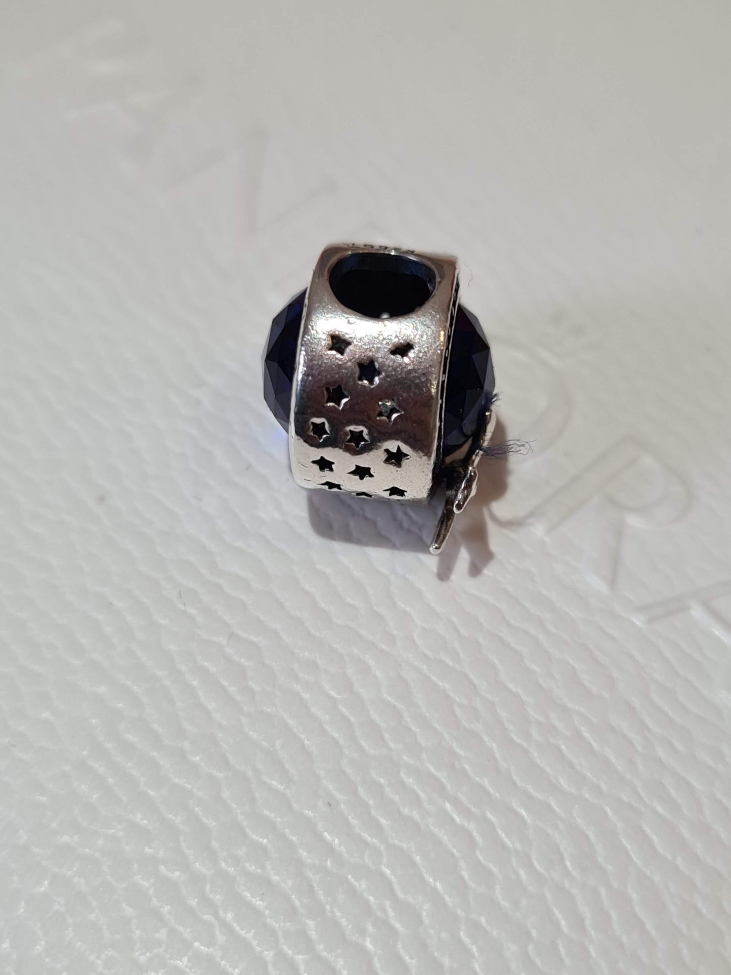 Genuine Silver Travel Charm With Beauiful Blue Stone and Aeroplane Detail.