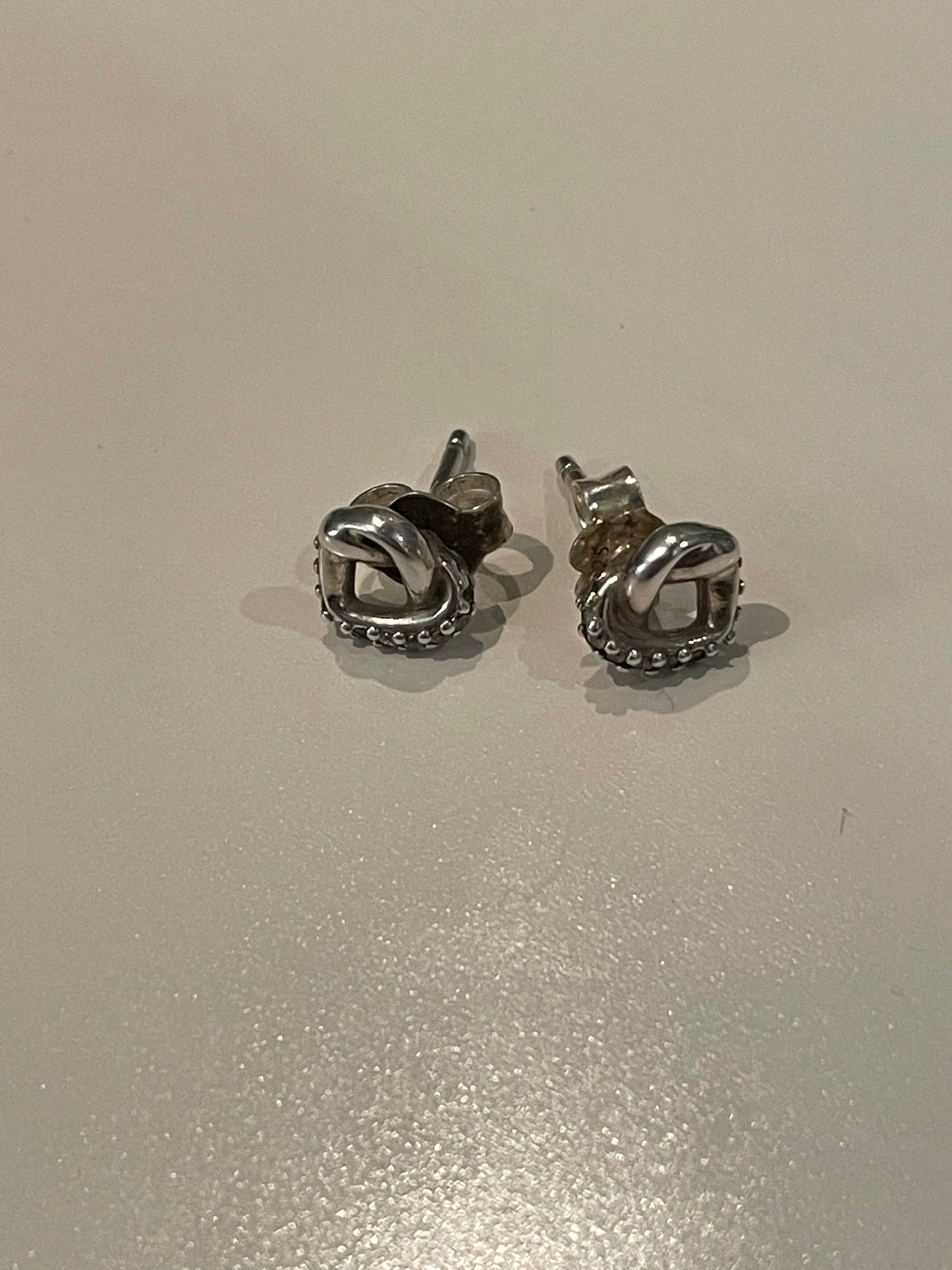 Genuine Pandora Pave intwined heart earrings