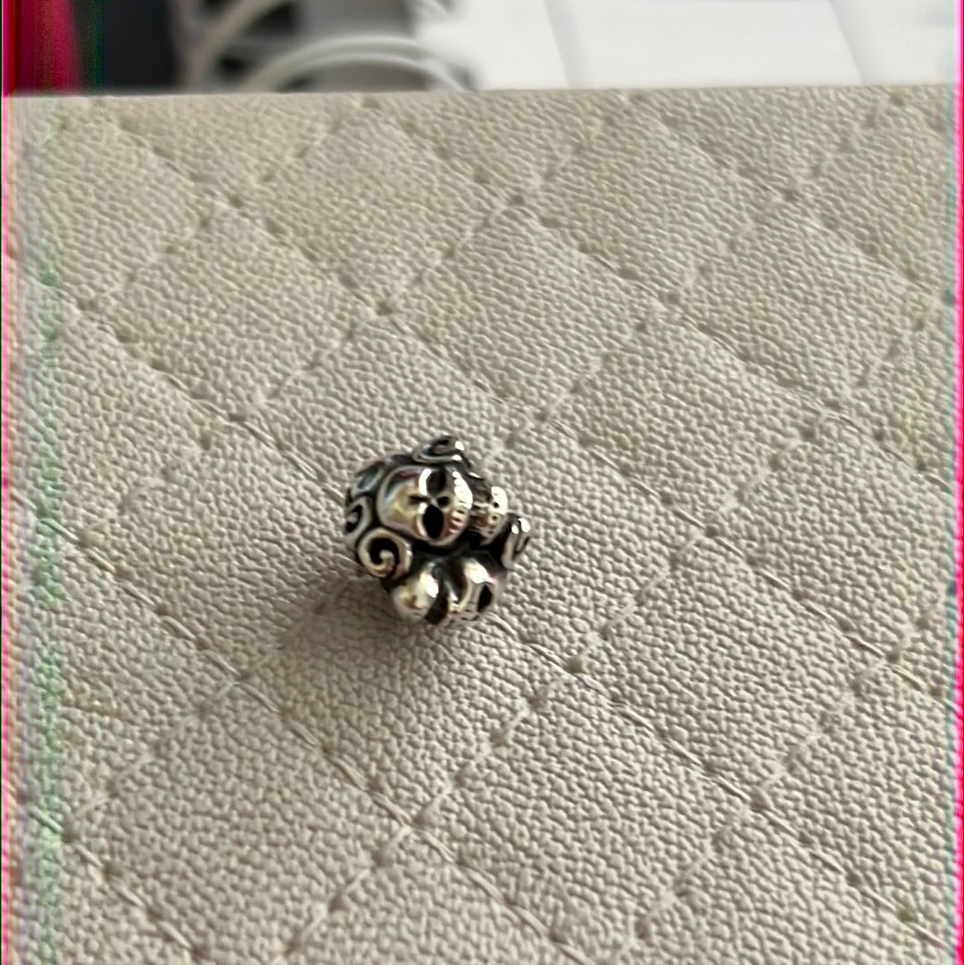 Sterling Silver Skull and Swirl Charm