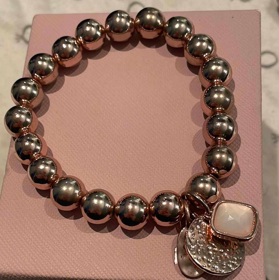 Rose Gold Colour Stretchy Bracelet With Pink Stone Details