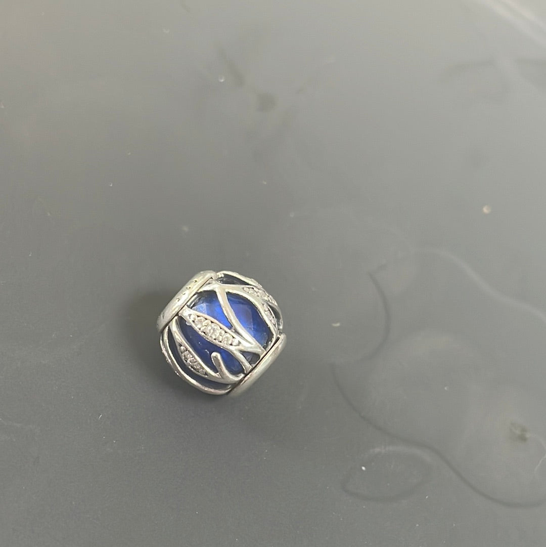 Genuine Pandora Encased In Leaves Blue sold as one