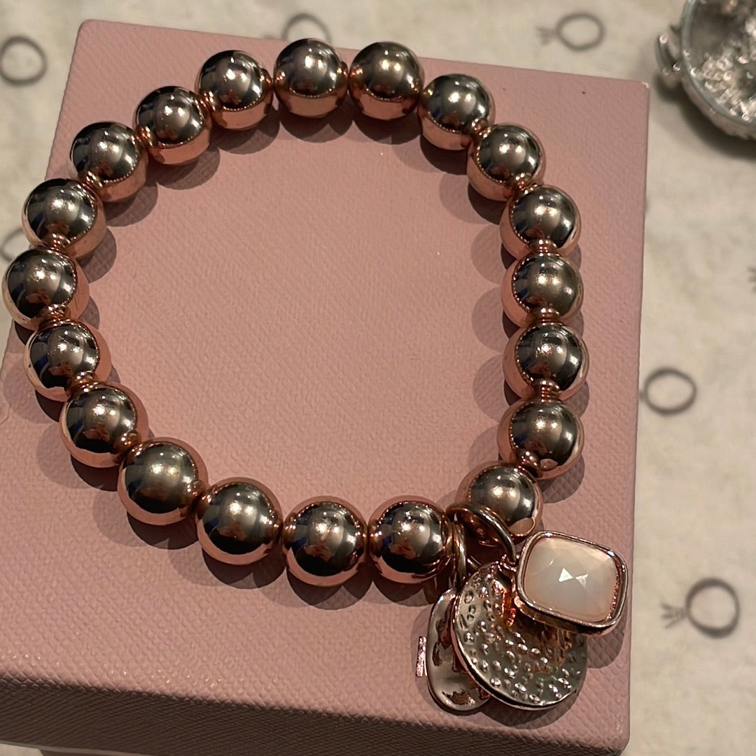 Rose Gold Colour Stretchy Bracelet With Pink Stone Details