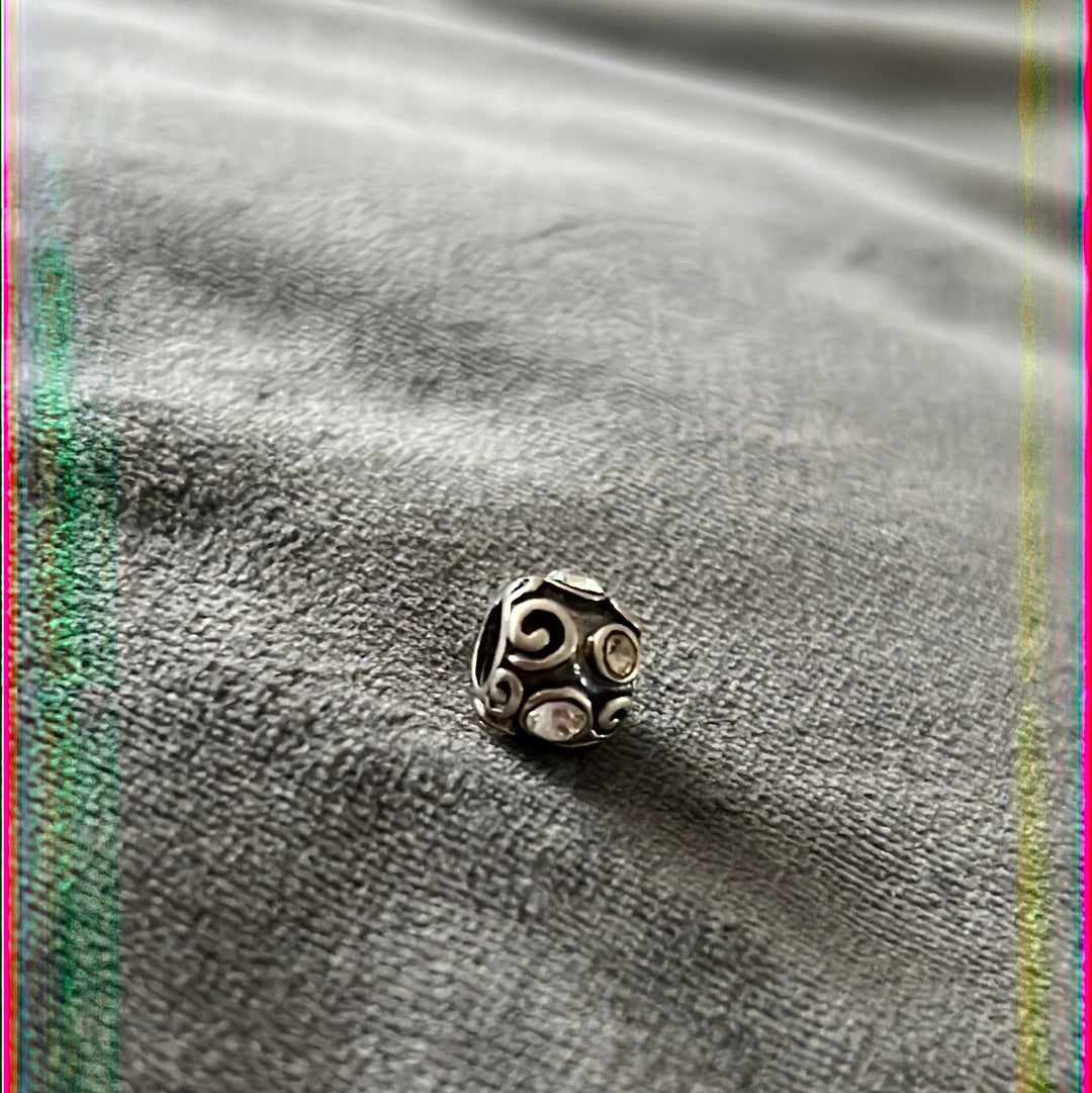 Sterling Silver Swirl And Clear CZ Charm